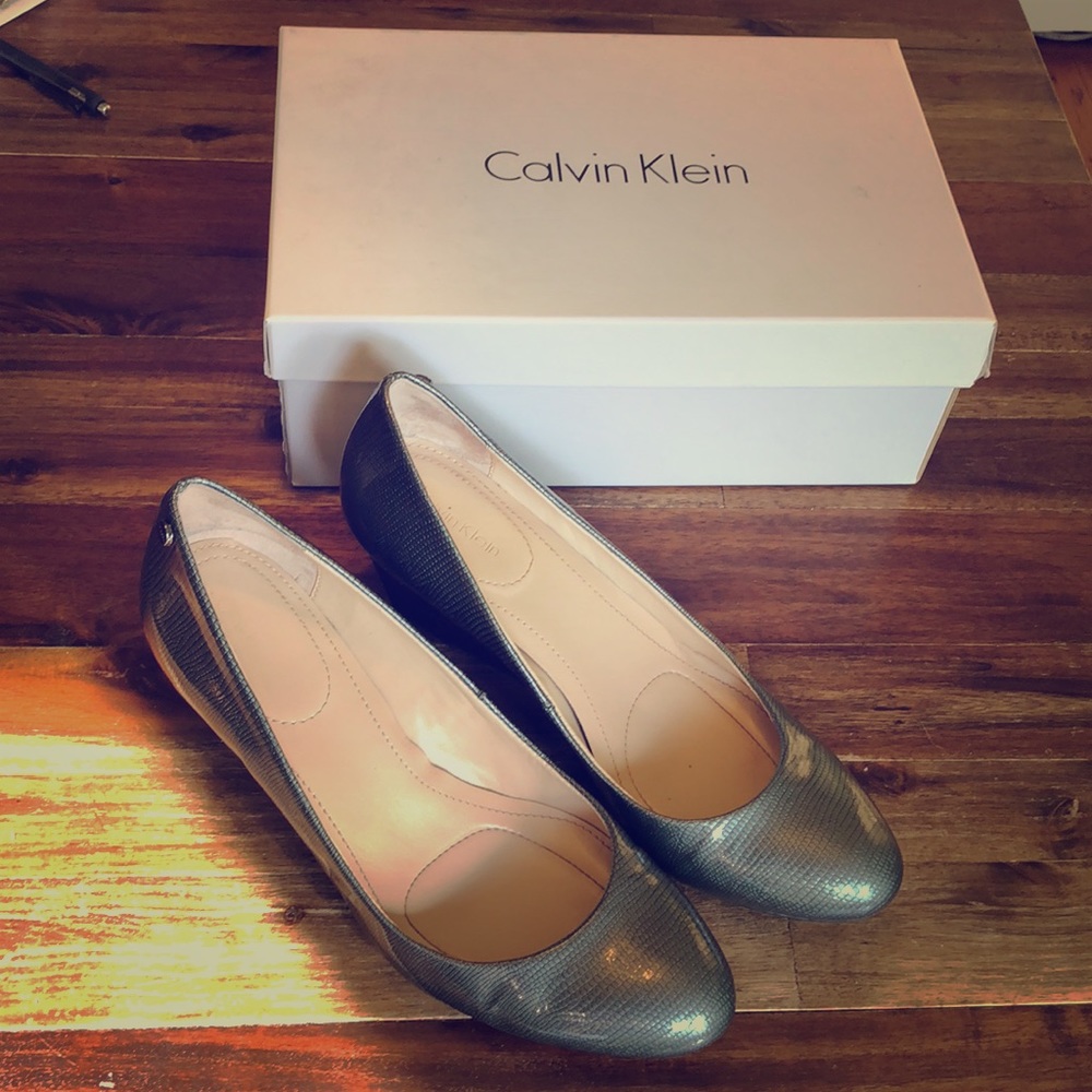 Calvin Klein grey patent wedge heel.